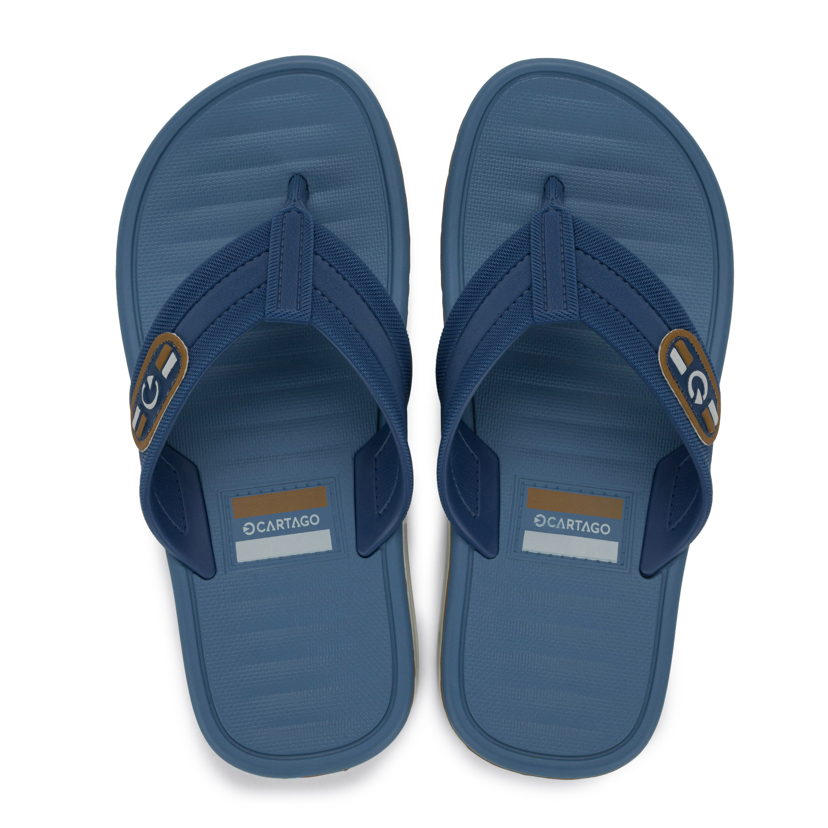 Chinelo infantil Cartago Paris II azul mostrando detalhes anatômicos e solado antiderrapante