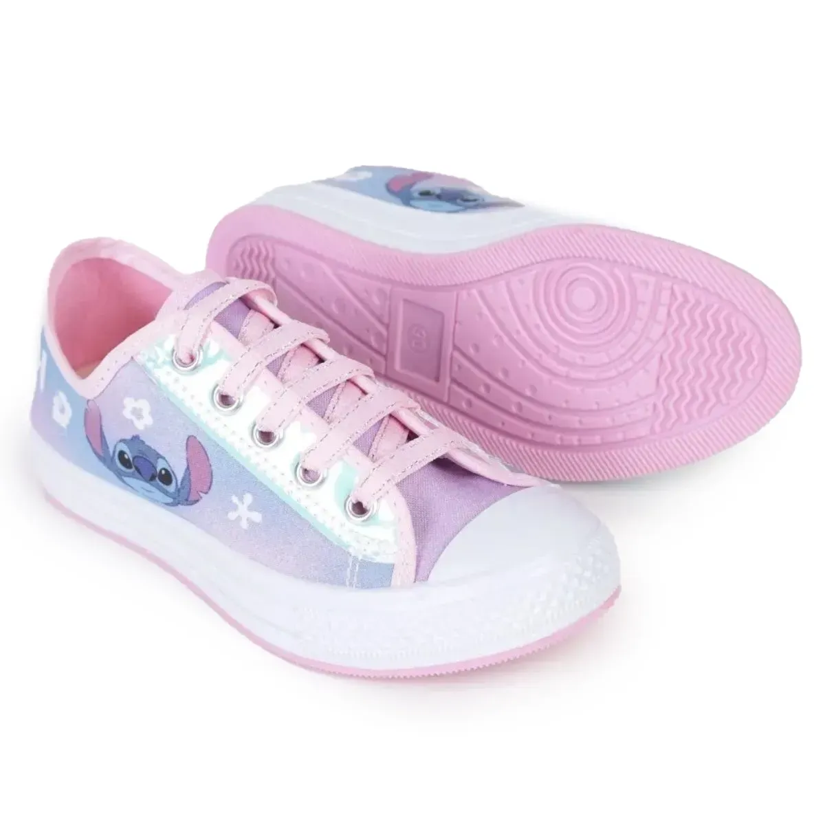 Vista lateral do tênis infantil Dyan Stitch rosa mostrando detalhes do tecido e solado