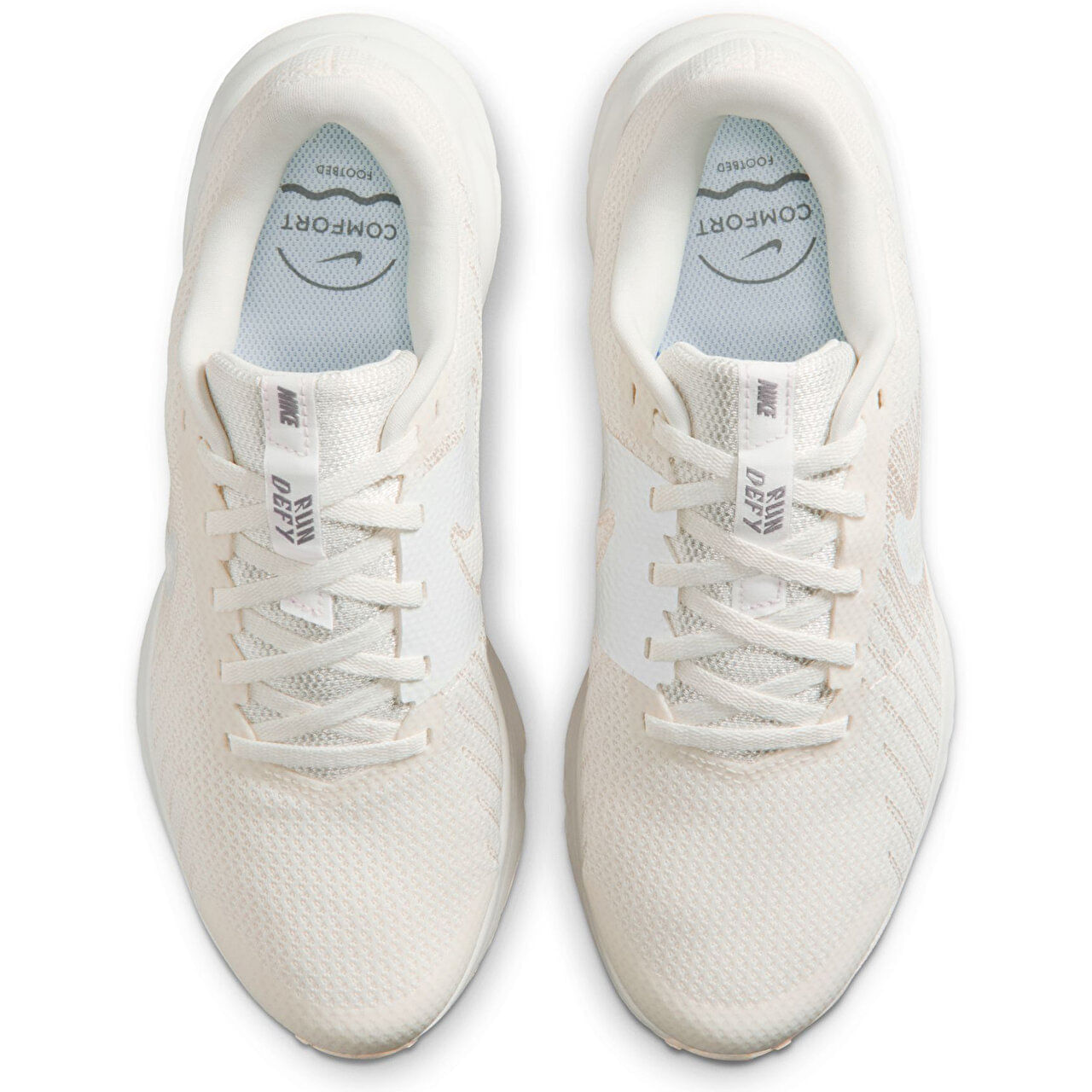 Tênis Nike Run Defy Feminino Branco vista lateral ajustada para seção vai servir