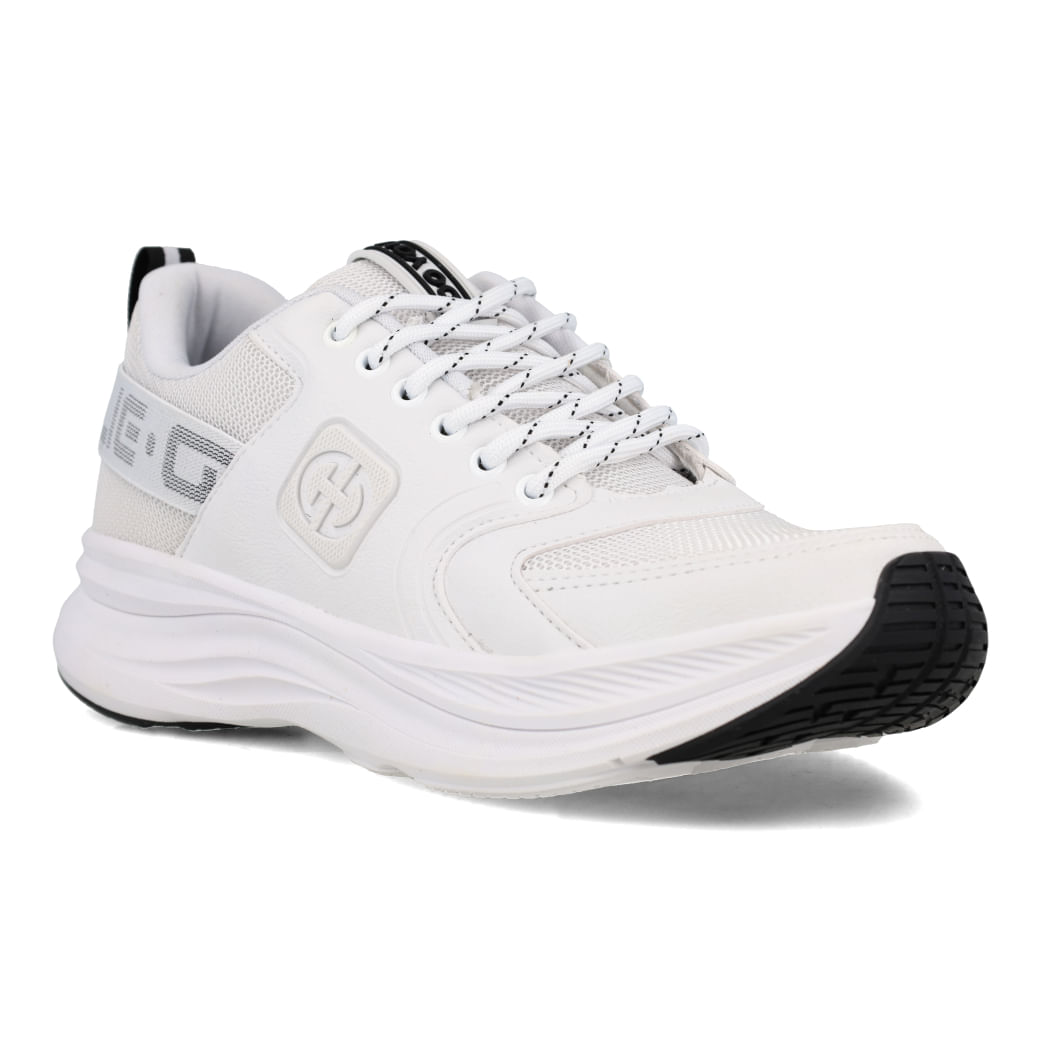 Tênis Ollie Virtus masculino branco, vista lateral destacando o solado em PVC emborrachado