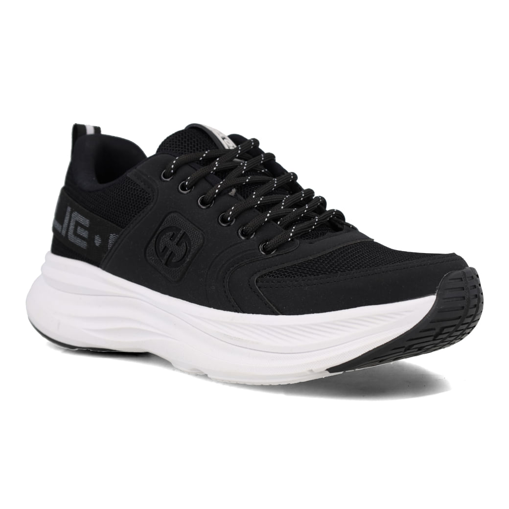 Vista lateral do tênis Ollie Virtus masculino preto mostrando detalhes do design e cadarço