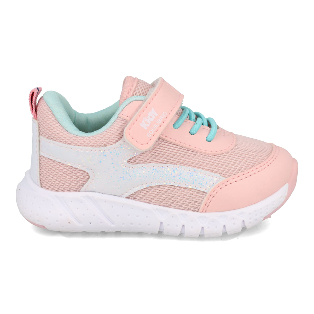 Tênis infantil Kidy nude com detalhes em verde e branco, design esportivo com glitter, fechamento por cadarço e solado branco.