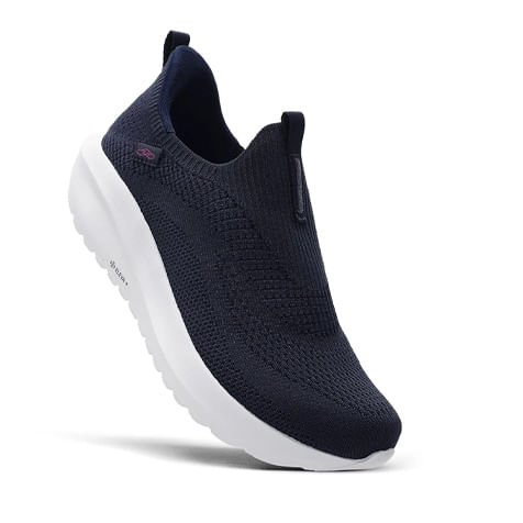 Tênis Olympikus Intuit marinho com design slip-on e solado branco espesso para conforto