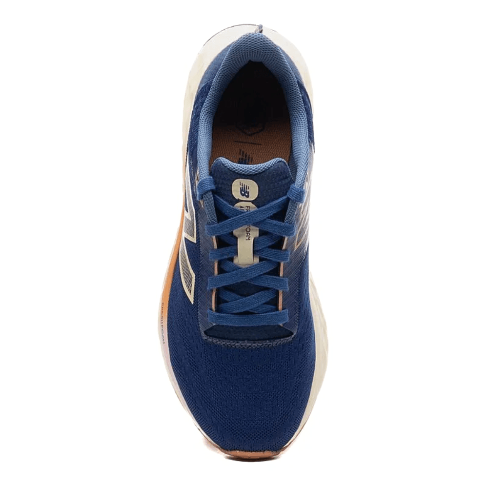 Vista superior do tênis New Balance Fresh Foam Arishiv4 azul com cadarços e palmilha anatômica