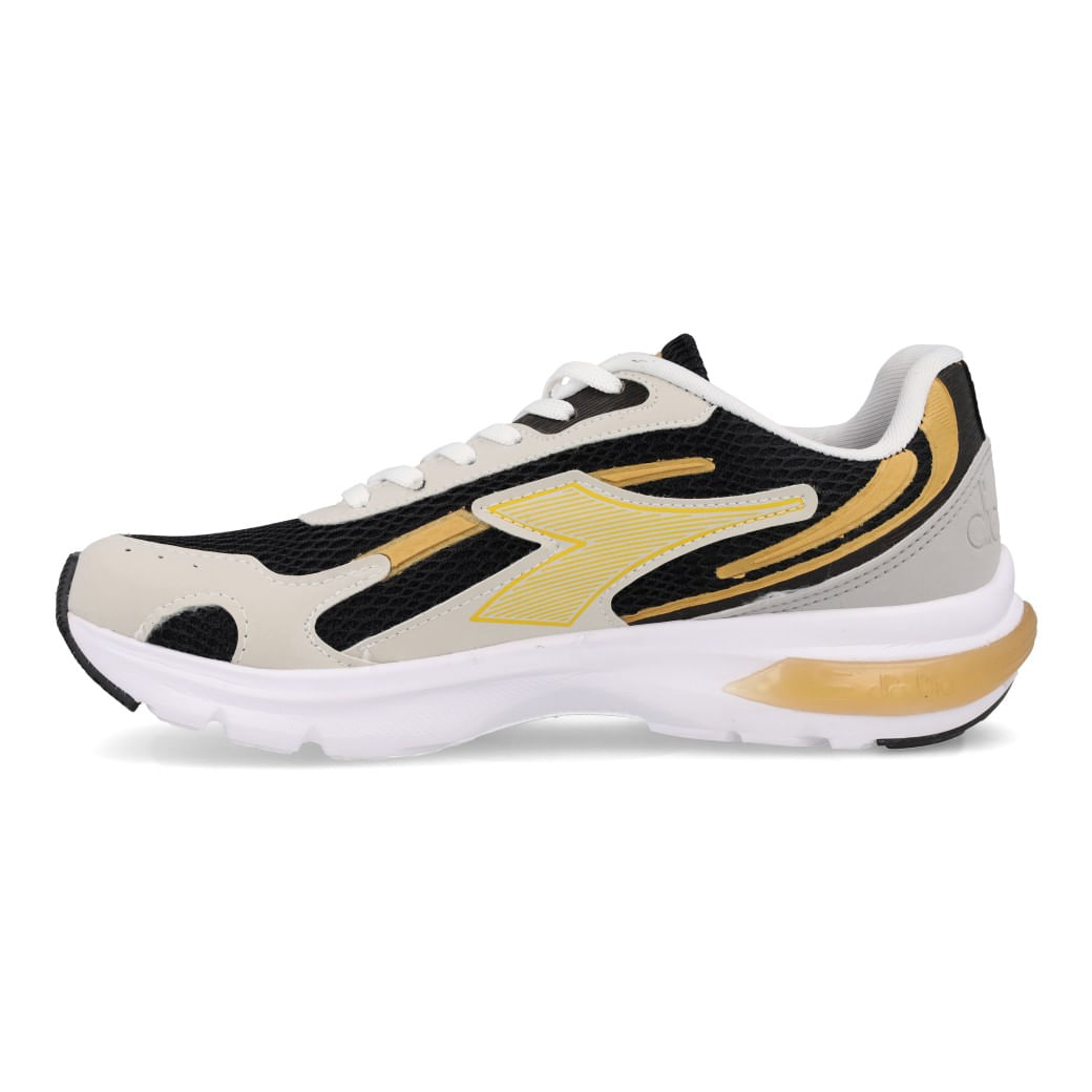 Tênis Diadora Massimo branco com detalhes dourados visto de lateral esquerda