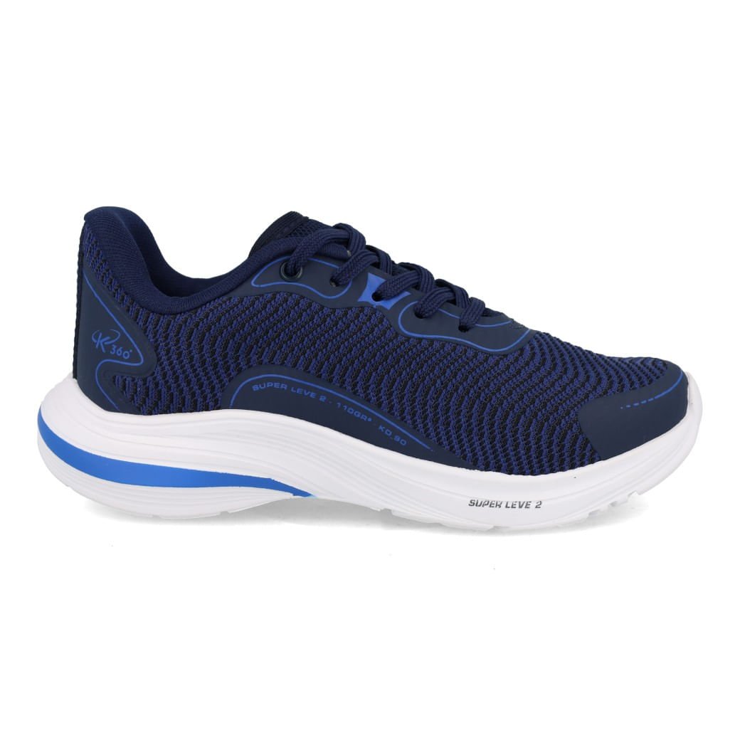 Tênis infantil Kidy marinho em perfil lateral direito com cabedal em mesh azul marinho e detalhes azul royal, fechamento em velcro, solado branco com faixa azul.