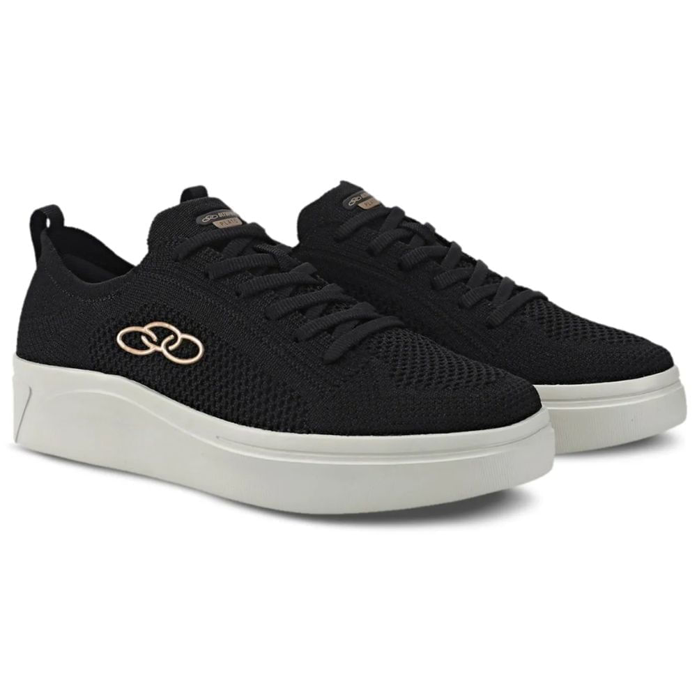 Par de tênis Olympikus Preto em perspectiva 3/4 mostrando frente e lateral direita