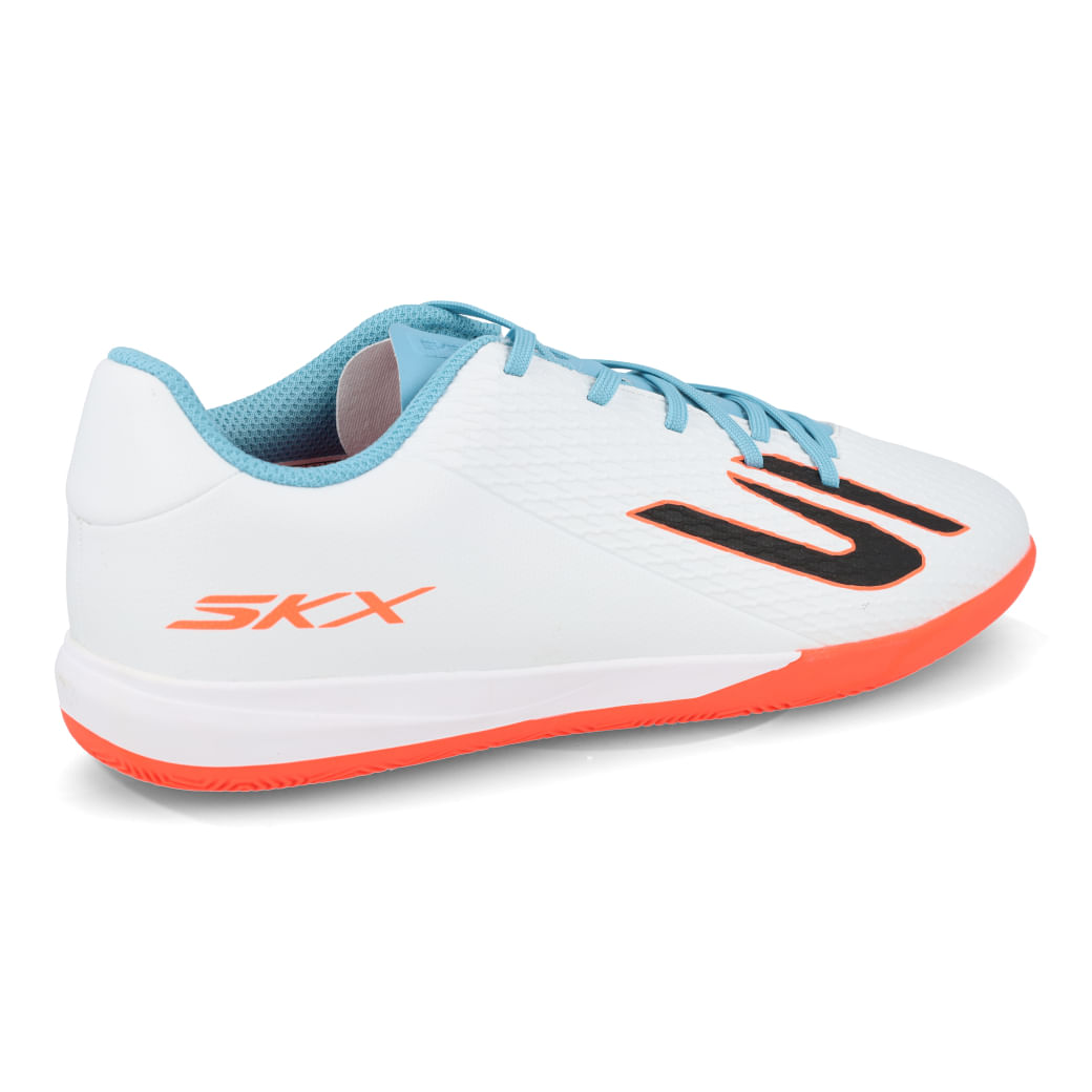 Chuteira infantil futsal Skechers SKX 2 Jr Youth branca com detalhes turquesa e rosa, vista lateral esquerda