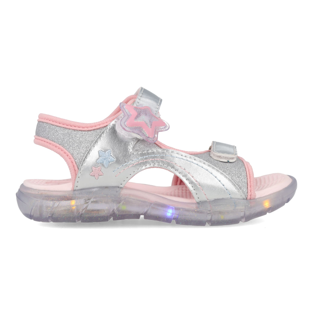 Sandália infantil feminina prata com detalhes rosa vista lateral direita com tiras em sintético prateado e sola translúcida com luzes LED