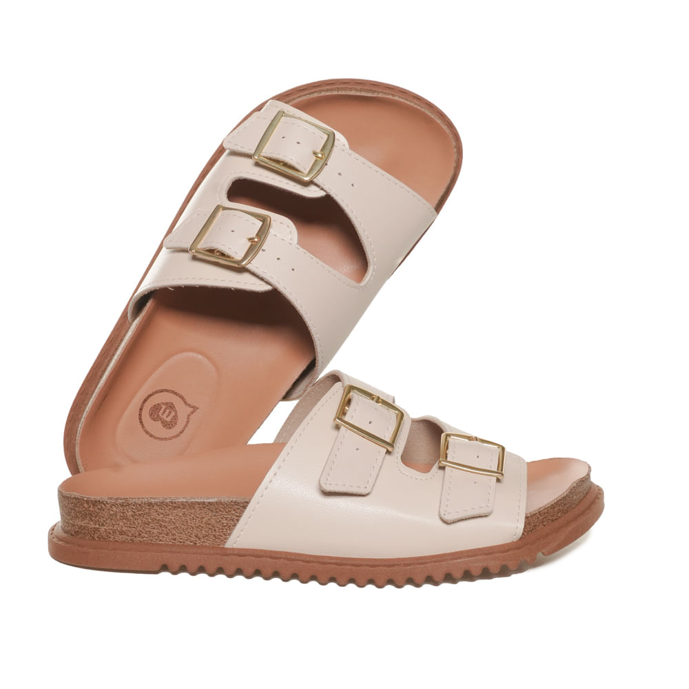 Par de tamancos infantis Molekinha branco off white mostrando detalhes das fivelas e palmilha acolchoada