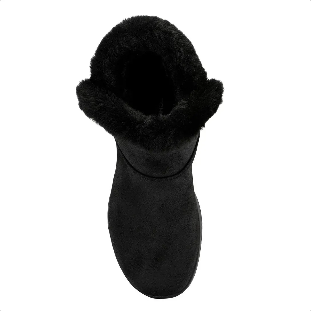 Bota feminina Skechers On-The-Go Joy vista frontal em ambiente casual