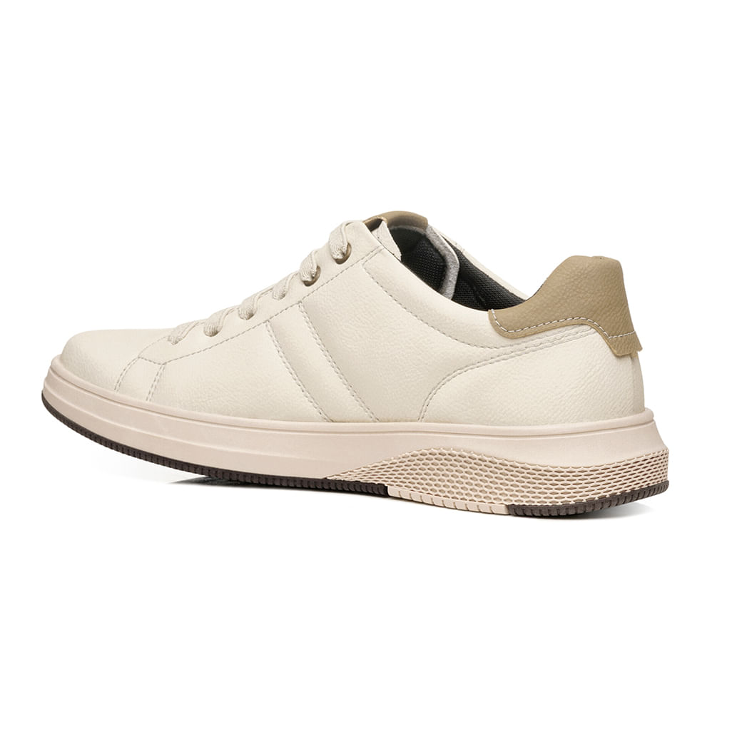 Tênis casual masculino Pegada creme visto de lado, ideal para uso casual e conforto.