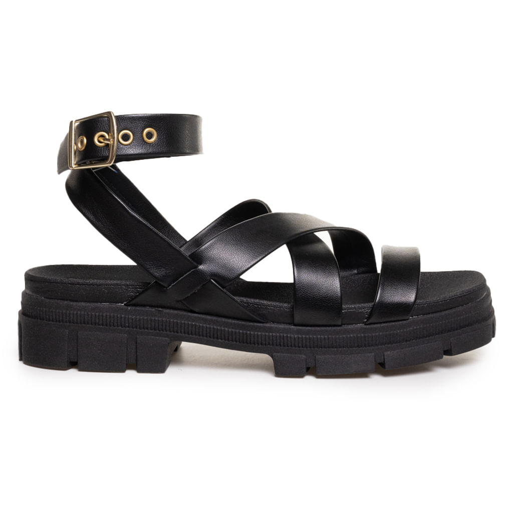 Sandália feminina preta Moleca vista lateral mostrando sola tratorada e tiras cruzadas