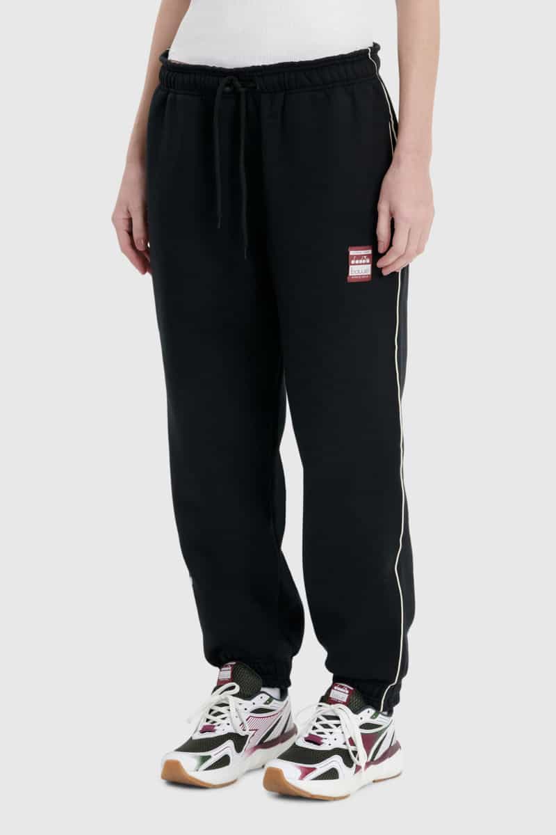TEXTIL CALCA ESPORTE UNISSEX PRETO 0089989-040 TRACK BAW X DIADORA POLIESTER-1761142717780