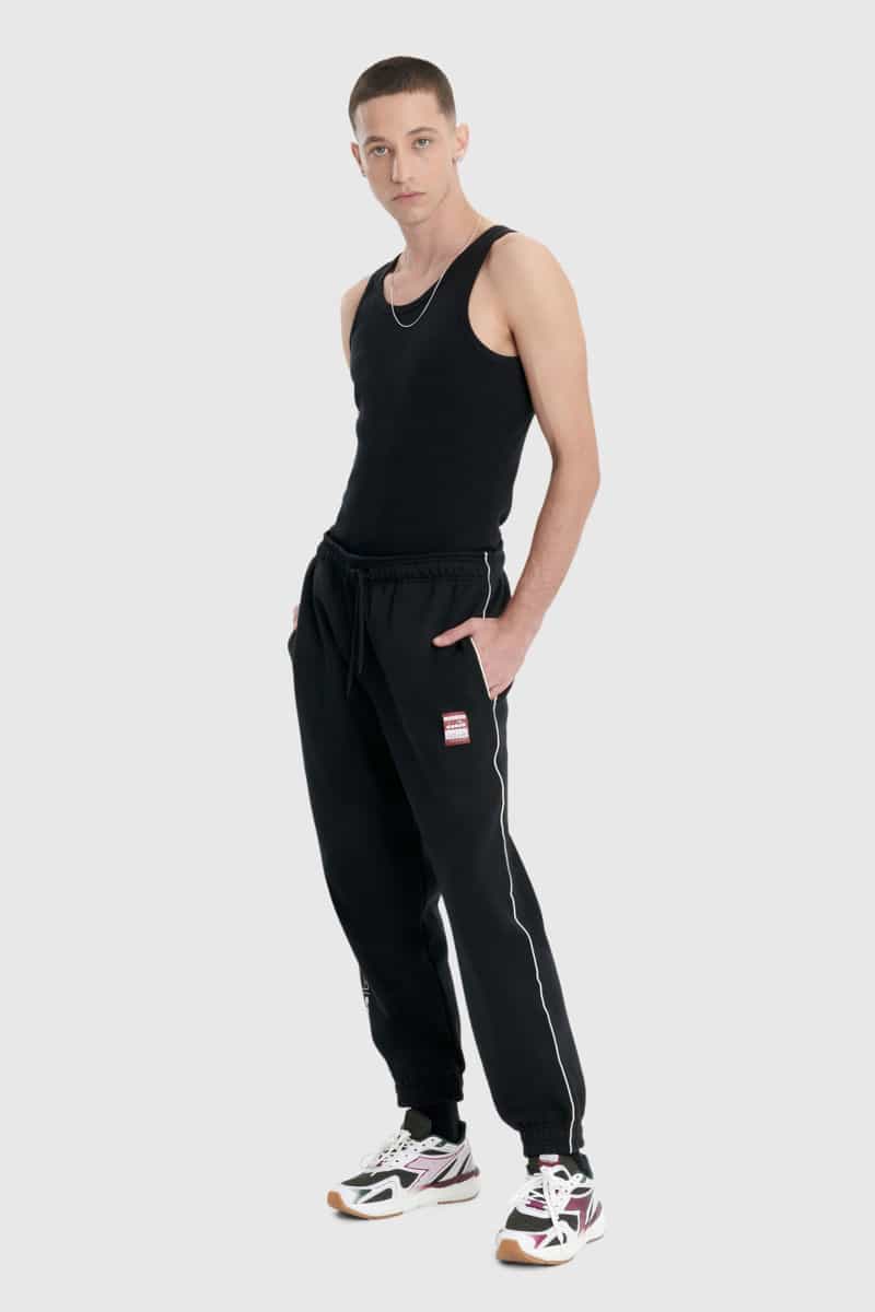 TEXTIL CALCA ESPORTE UNISSEX PRETO 0089989-040 TRACK BAW X DIADORA POLIESTER-1761142728067