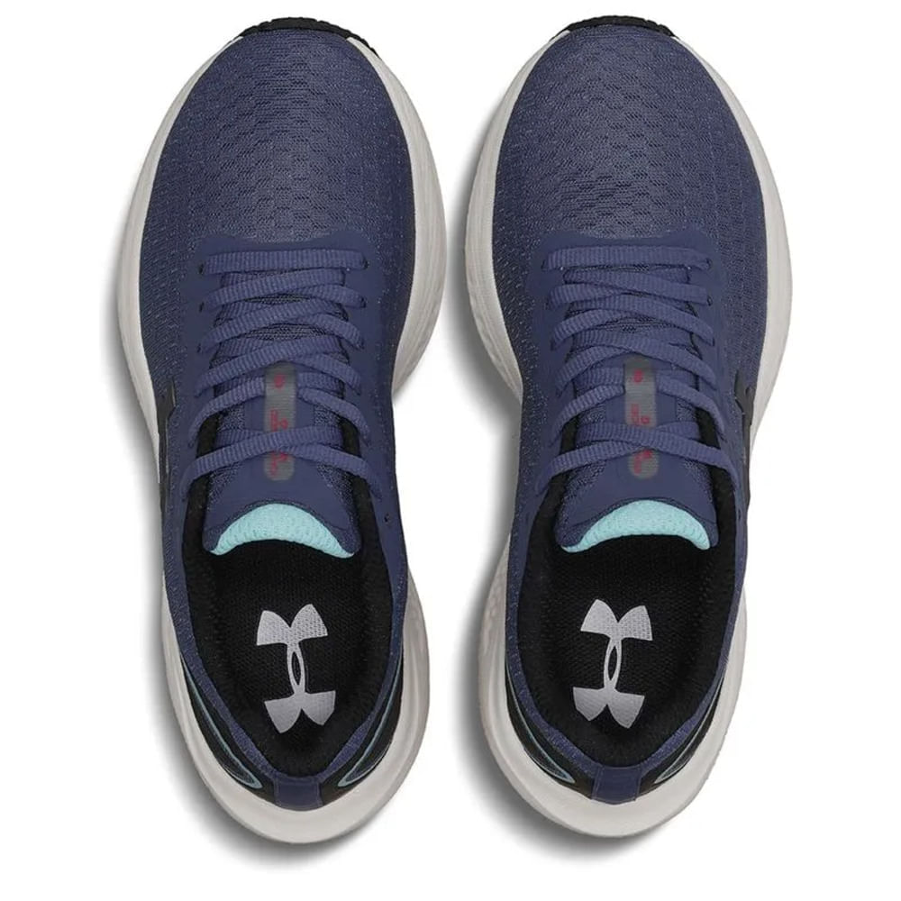Tênis Under Armour Charged Wing 2 Feminino Marinho em ângulo lateral mostrando fechamento com cadarço e design do solado