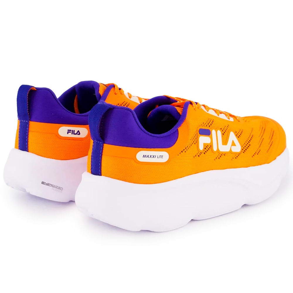 Tênis FILA Maxxi Lite masculino laranja em vista lateral esquerda destacando o design aerado e entressola espessa.